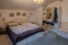 Einseitig angebautes Einfamilienhaus mit Garage in guter Lage von Bruckmühl! - Schlafzimmer