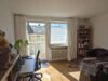 2,5-Zimmer-ETW, Innenstadt, mit Balkon, gut vermietet! - Wohnzimmer mit Balkon