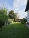Zwei Wohneinheiten, ein Zuhause - Charmantes Zweifamilienhaus in begehrter Wohnlage von Rosenheim! - Blick in den Garten
